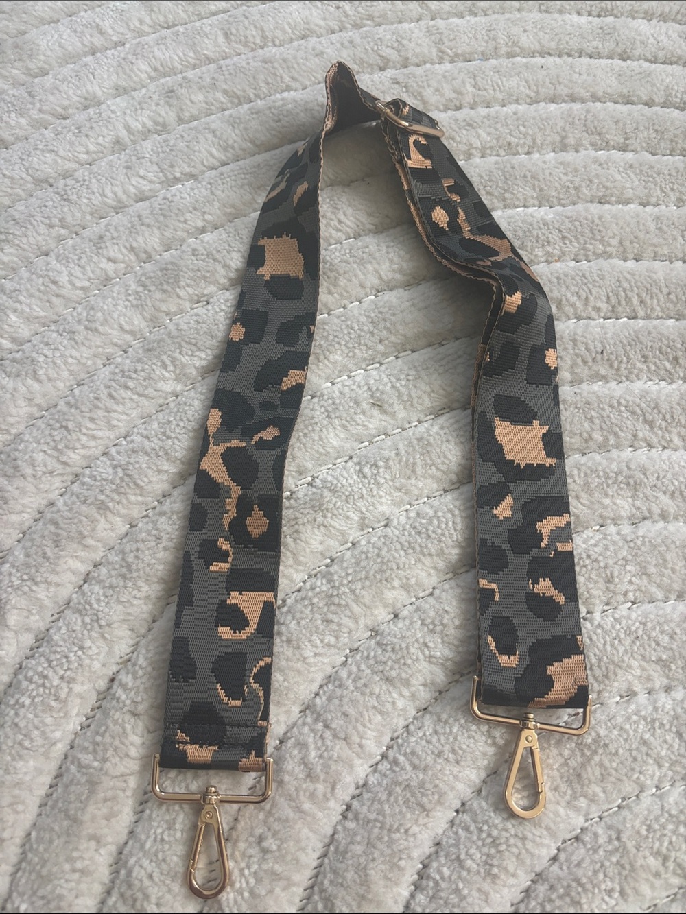 Leopard Print Adjustable Bag Strap in Black and Tan bought from a boutique